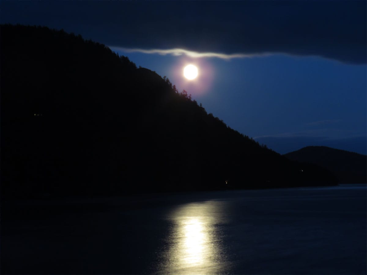 image of full moon over water prayer for releasing emotions