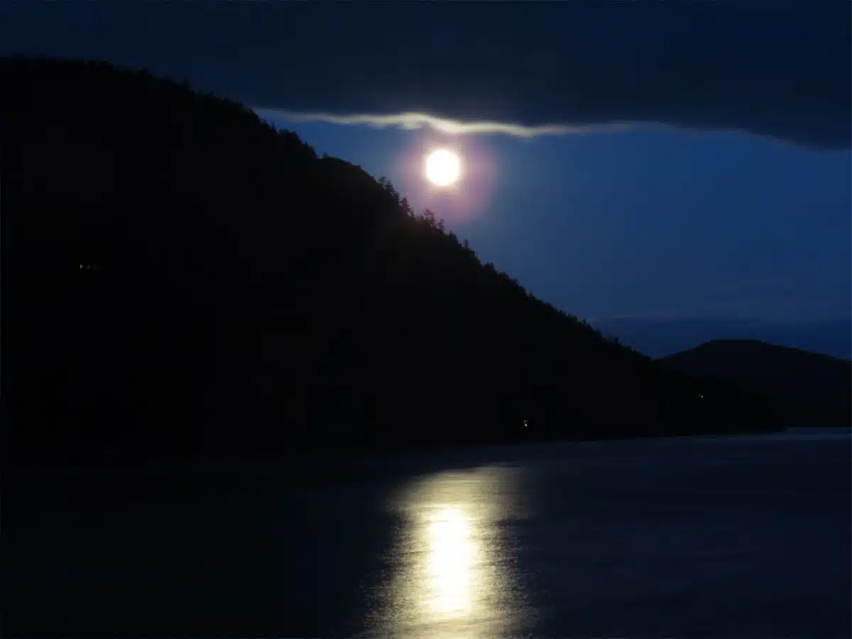 image of full moon over water prayer for releasing emotions