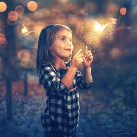Soul retrieval shamanic healing workshop. Image of a little girl pointing to a butterfly made of light.